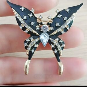 Elegant Black and Gold Butterfly Brooch